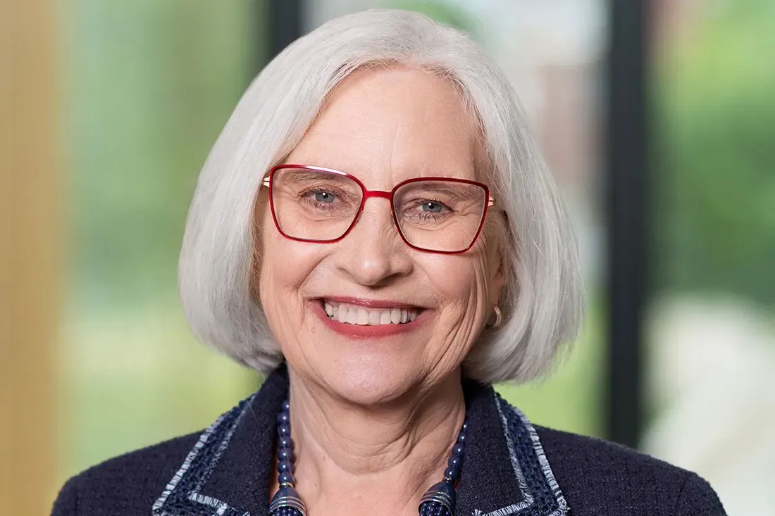 Lois Agnew sitting in an office.